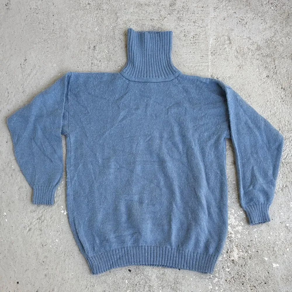 The little alpaca house turtleneck sweater